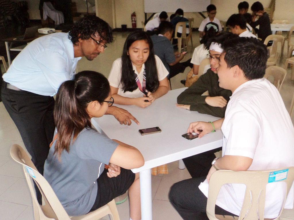 Encouraging them, while they were doing their group work, answering the questions I gave them (1)