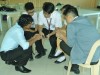 Encouraging them, while they were doing their group work and answering their questions